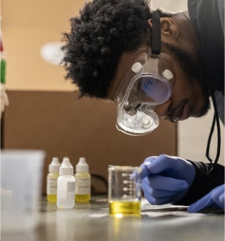 Image of student performing experiment
